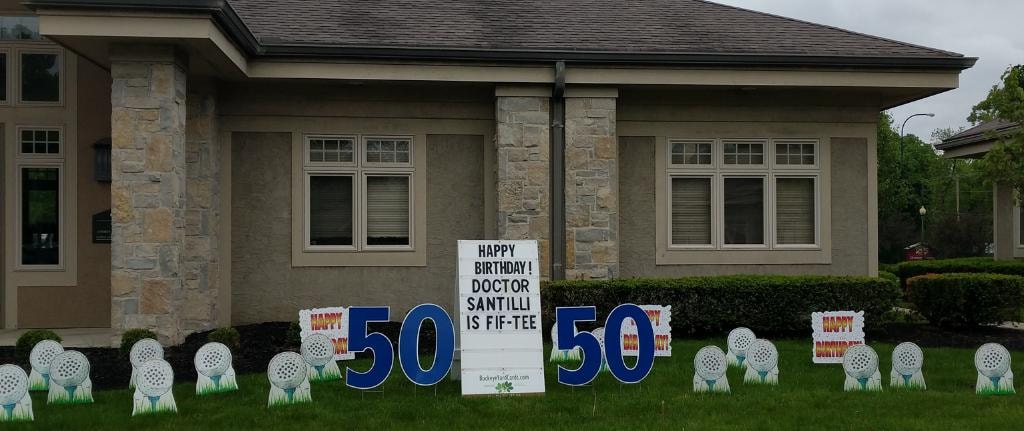 Golf ball lawn signs for Dr. Santilli's 50th birthday