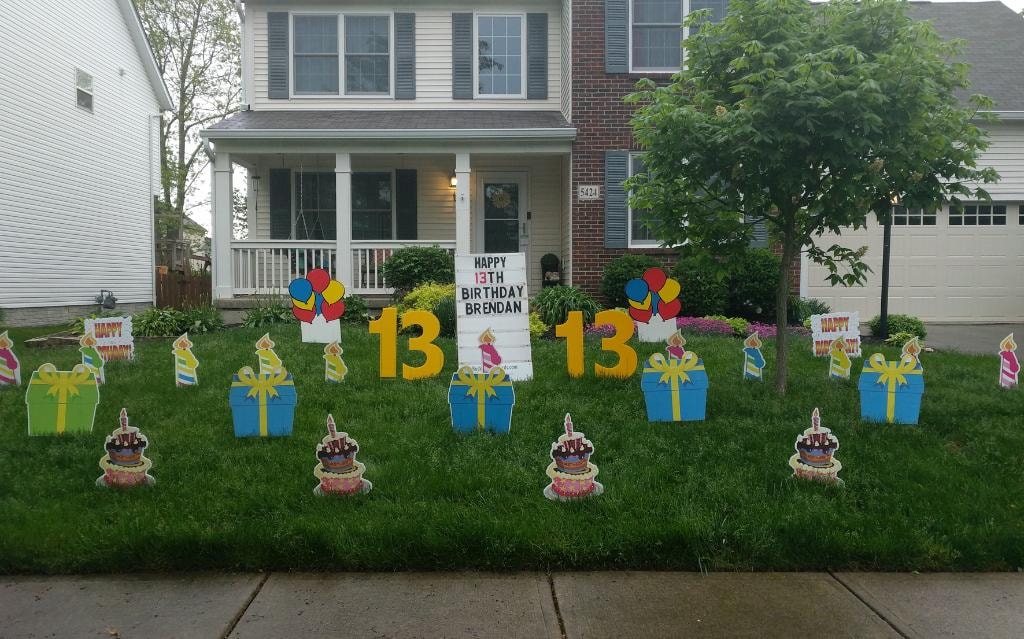 Colorful birthday yard signs for Brendan's 13th birthday