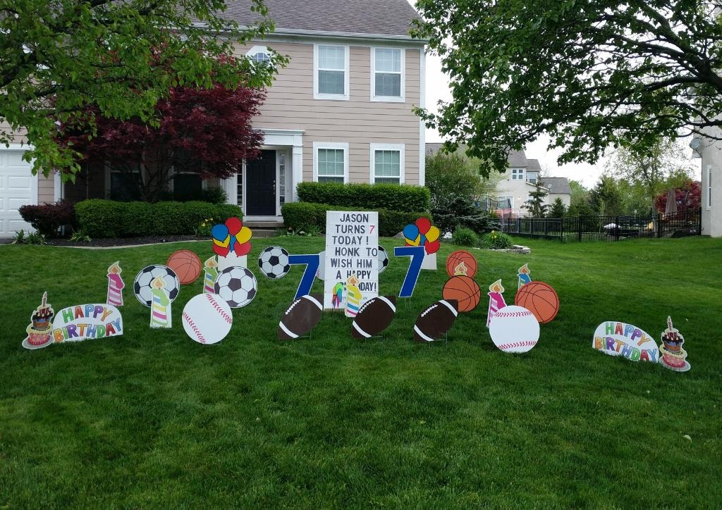 Sports themed birthday yard sign display for Jason's 7th birthday
